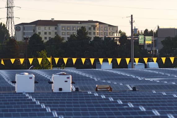 Solar array with Courtyard - Lancaster in the distance. Amy Spangler, Solar Media Day, 07.11.2018